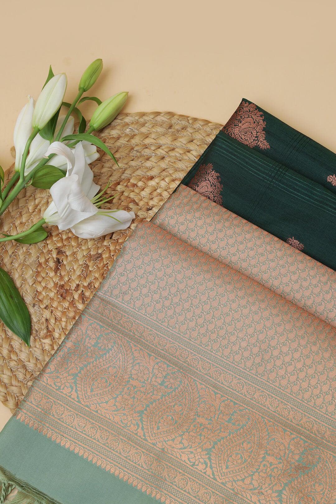 Semi Tussar silk saree in Dark Green and Sea Green bronze zari pallu - handcrafted saree from Semi Tussar Silk Saree collection